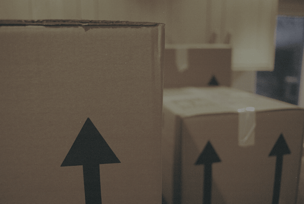 an image of stacked moving boxes